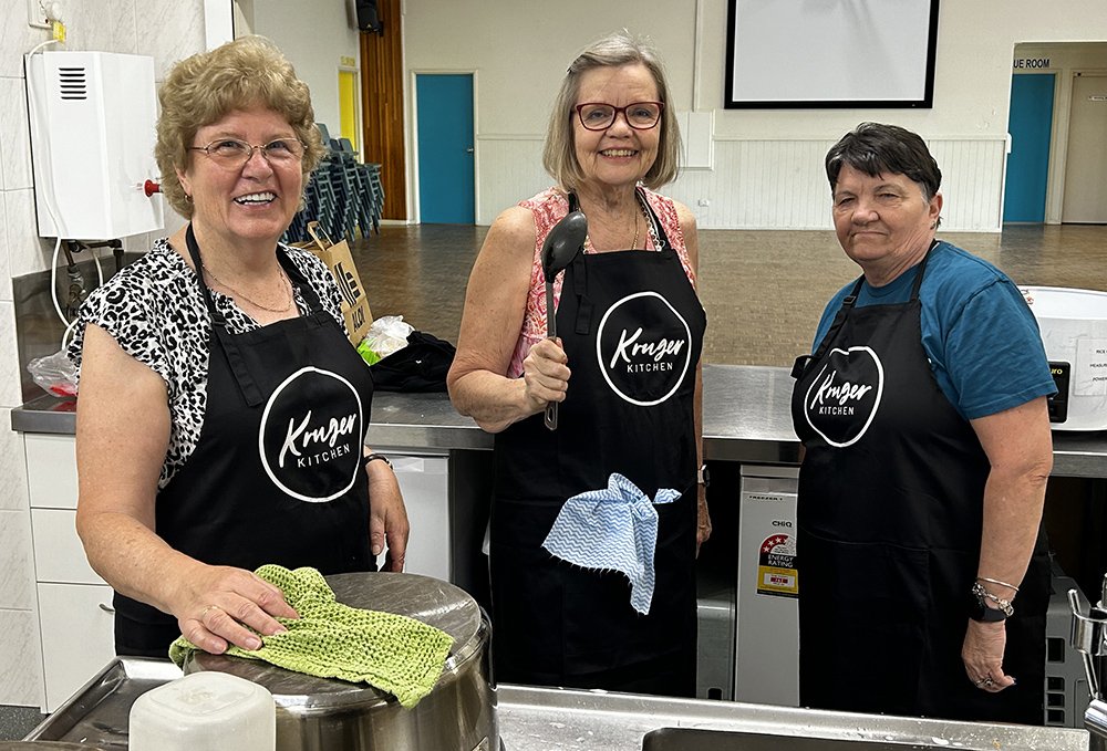Volunteers from Kruger Baptist Church provide meals to people in the Redbank community who are struggling