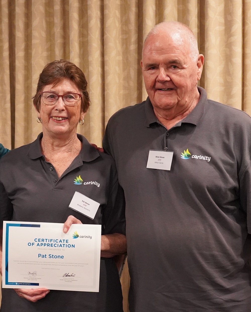 Pat celebrating her retirement from prison chaplaincy with her husband, Brian.